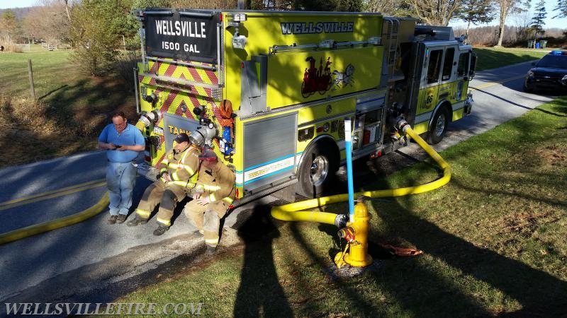 Tanker 66 Supplying water to a house fire on 4/11/15. Photo by J. Albert