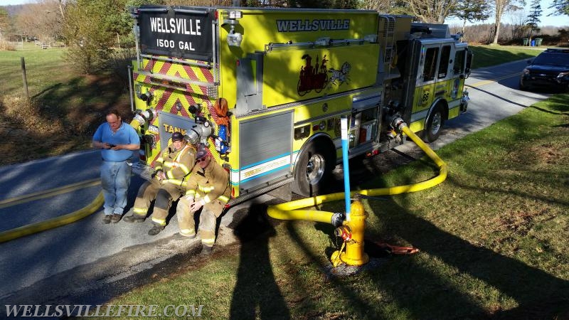 Tanker 66 Supplying water to a house fire on 4/11/15. Photo by J. Albert