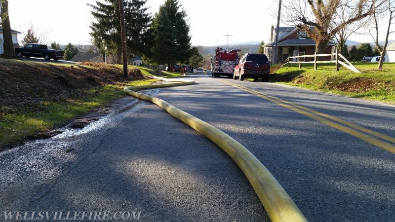 Tanker 66 Supplying water to a house fire on 4/11/15. Photo by J. Albert