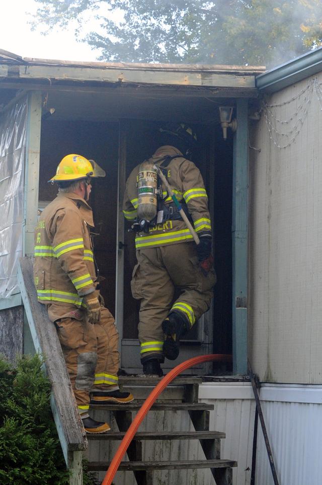 Mobile Home Filled with smoke on Friday morning, September 20.  Photo by Curt Werner