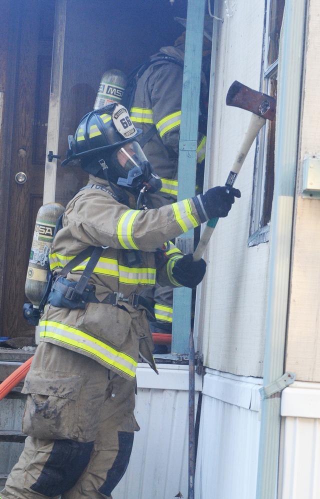 Mobile Home Filled with smoke on Friday morning, September 20.  Photo by Curt Werner