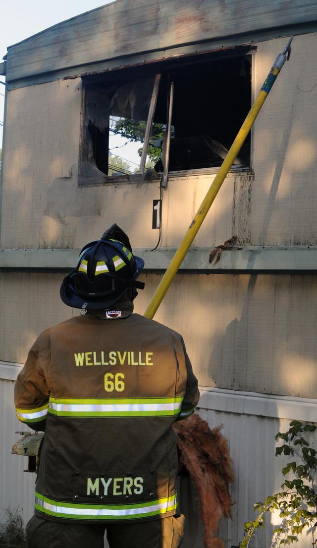 Mobile Home Filled with smoke on Friday morning, September 20.  Photo by Curt Werner