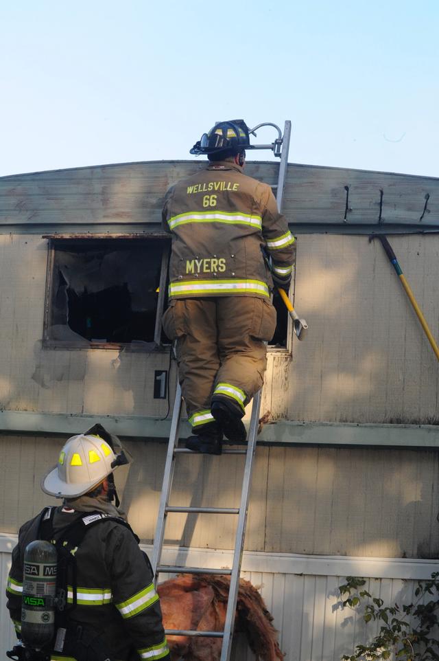 Mobile Home Filled with smoke on Friday morning, September 20.  Photo by Curt Werner