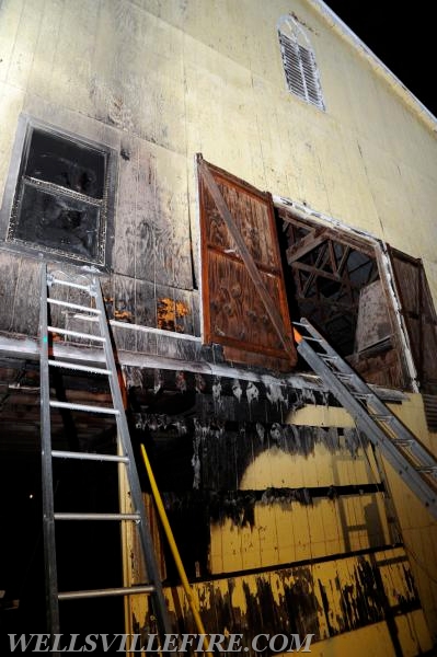 Quick action saves barn on Main St, Wellsville, May 20th, 1:00 a.m.  photos by Curt Werner