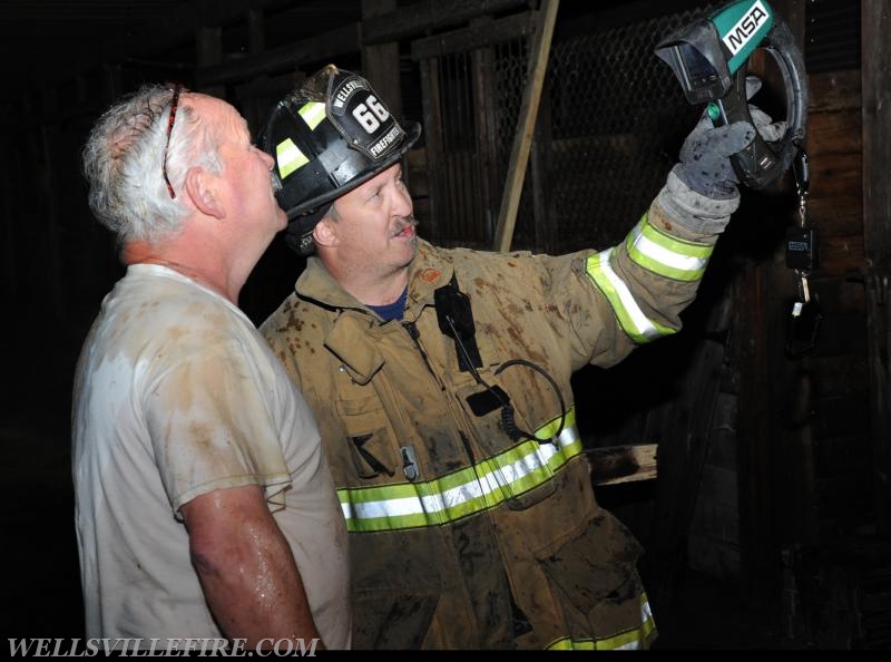 Quick action saves barn on Main St, Wellsville, May 20th, 1:00 a.m.  photos by Curt Werner
