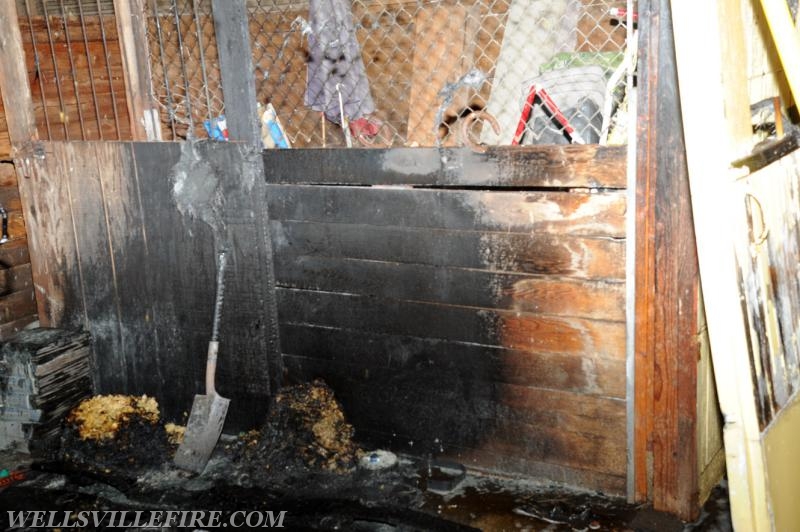 Quick action saves barn on Main St, Wellsville, May 20th, 1:00 a.m.  photos by Curt Werner