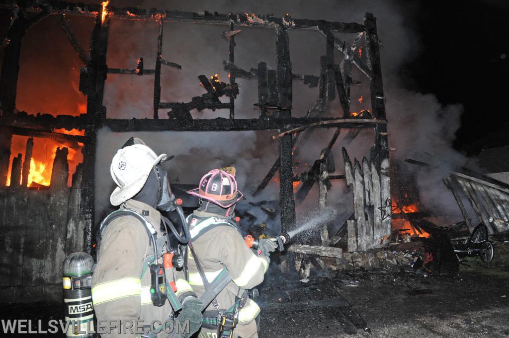 July 4, Saturday, barn fire on North Street in Wellsville.  photos by curt werner