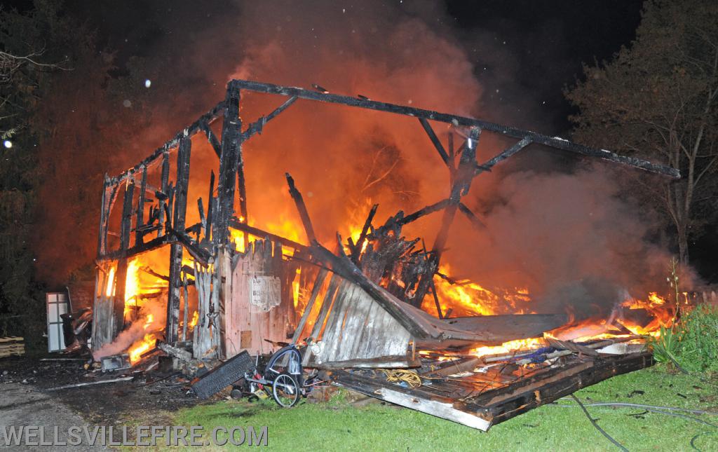 July 4, Saturday, barn fire on North Street in Wellsville.  photos by curt werner
