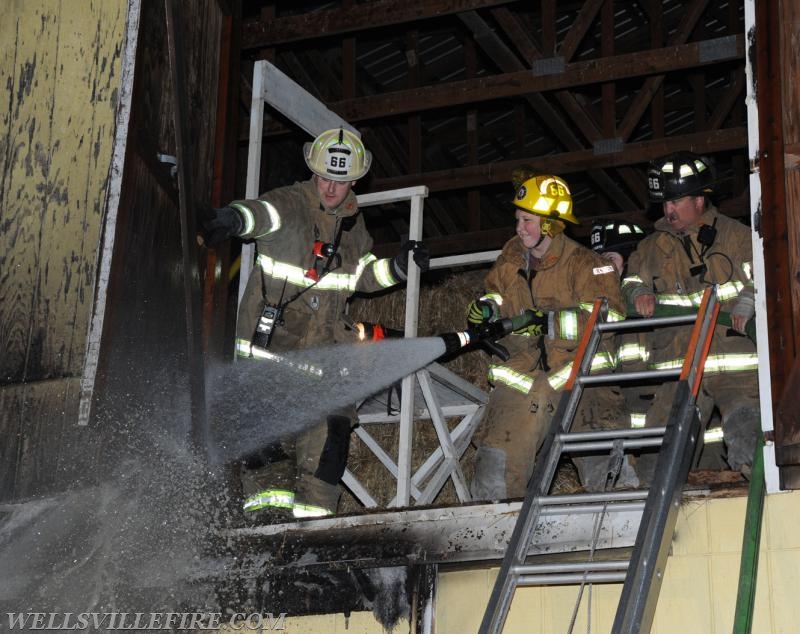 Quick action saves barn on Main St, Wellsville, May 20th, 1:00 a.m.  photos by Curt Werner