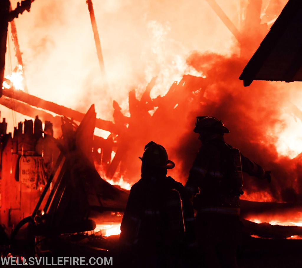 July 4, Saturday, barn fire on North Street in Wellsville.  photos by curt werner