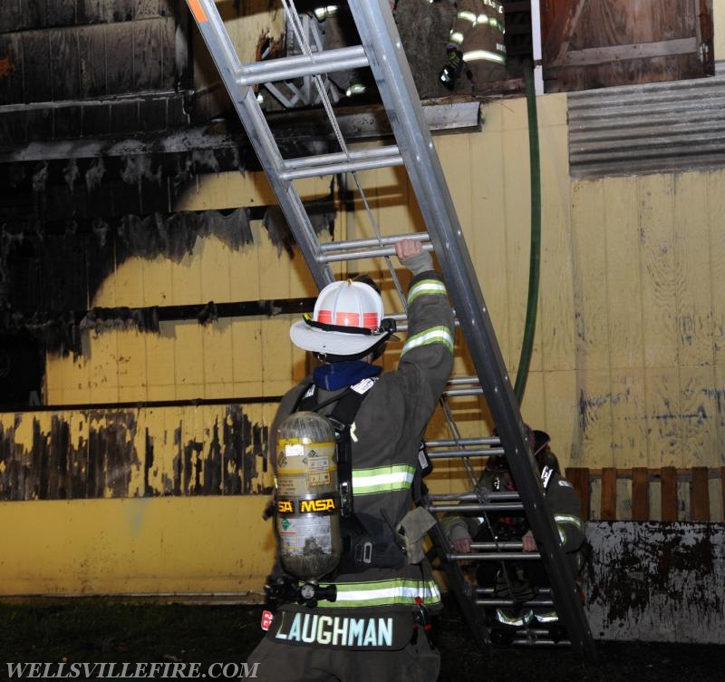 Quick action saves barn on Main St, Wellsville, May 20th, 1:00 a.m.  photos by Curt Werner