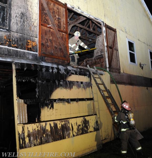 Quick action saves barn on Main St, Wellsville, May 20th, 1:00 a.m.  photos by Curt Werner