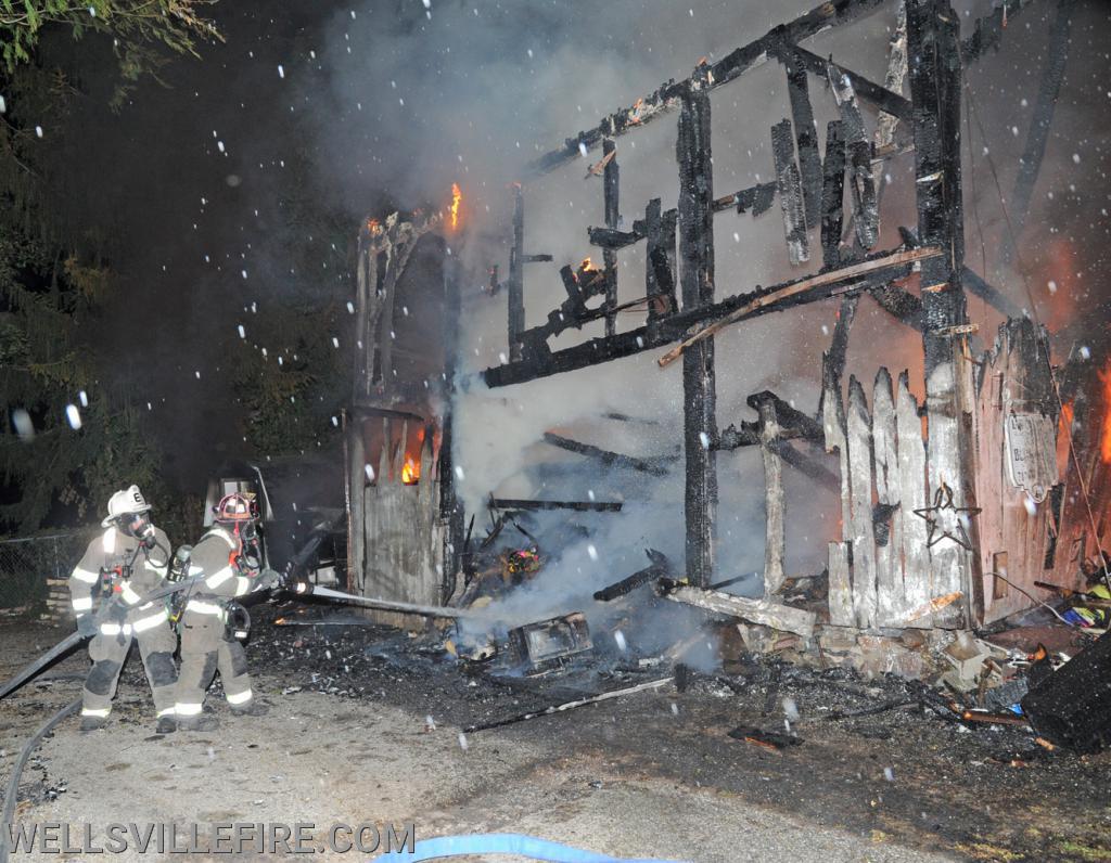 July 4, Saturday, barn fire on North Street in Wellsville.  photos by curt werner