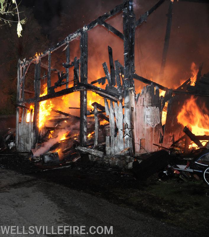 July 4, Saturday, barn fire on North Street in Wellsville.  photos by curt werner