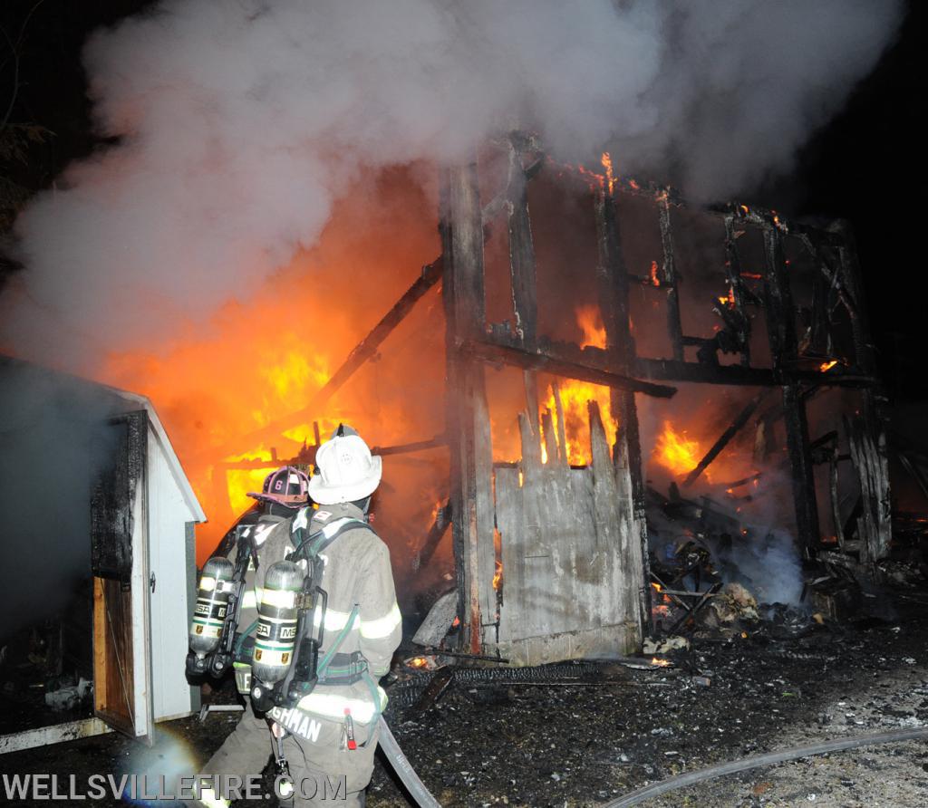 July 4, Saturday, barn fire on North Street in Wellsville.  photos by curt werner