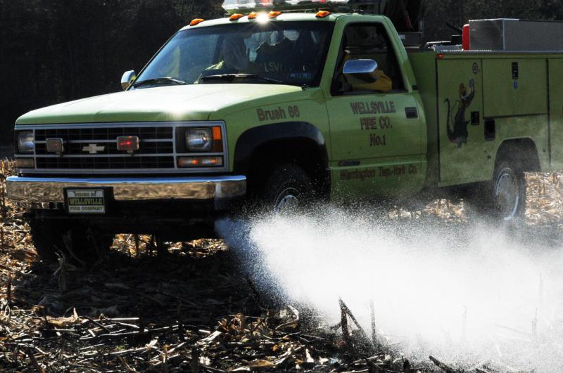 Brush fire in a corn field Franklin Township on Saturday, November 22.  Photos by Curt Werner