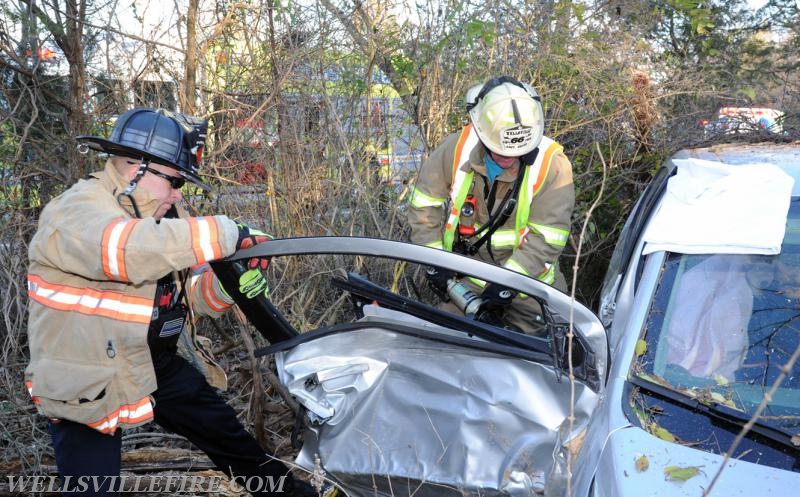 11/28/17, car into woods on Wellsville Road and Harmony Grove Road.  Jaws of Life used.  photos by curt werner