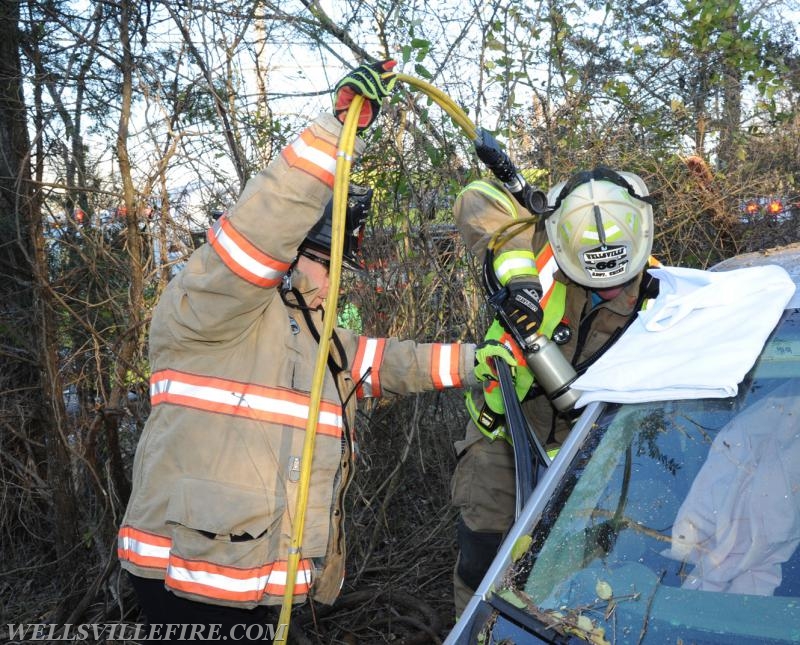 11/28/17, car into woods on Wellsville Road and Harmony Grove Road.  Jaws of Life used.  photos by curt werner