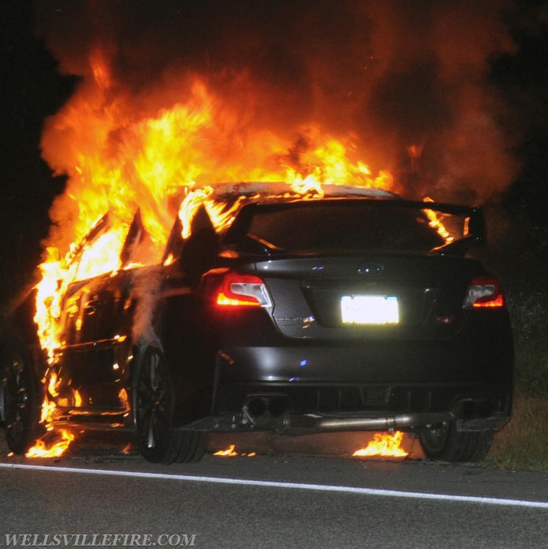 08/18/18, car fire on Old York Road early in morning, :56 a.m.  Wellsville firefighters attack blaze.  photos by curt werner