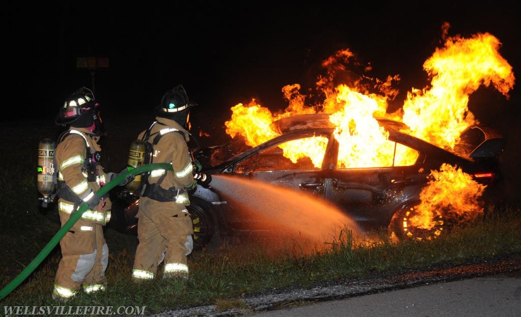 08/18/18, car fire on Old York Road early in morning, :56 a.m.  Wellsville firefighters attack blaze.  photos by curt werner