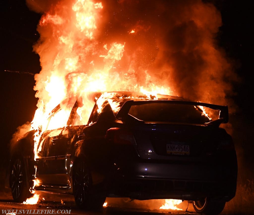 08/18/18, car fire on Old York Road early in morning, :56 a.m.  Wellsville firefighters attack blaze.  photos by curt werner