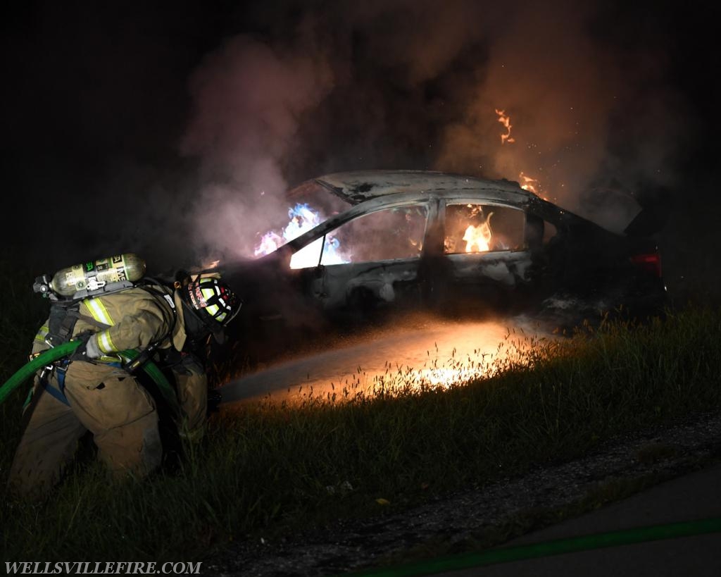 08/18/18, car fire on Old York Road early in morning, :56 a.m.  Wellsville firefighters attack blaze.  photos by curt werner