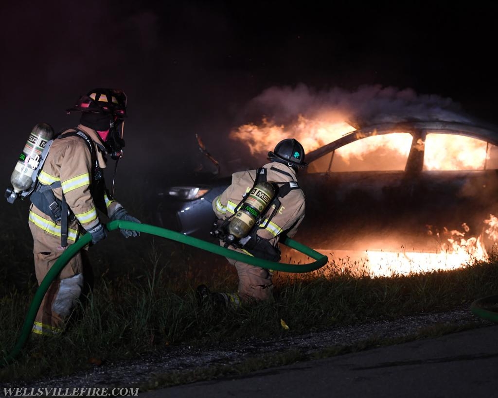 08/18/18, car fire on Old York Road early in morning, :56 a.m.  Wellsville firefighters attack blaze.  photos by curt werner