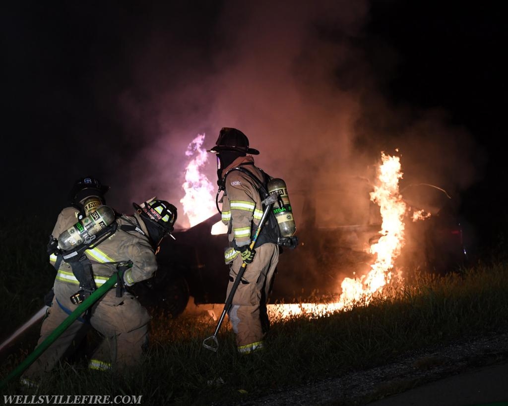 08/18/18, car fire on Old York Road early in morning, :56 a.m.  Wellsville firefighters attack blaze.  photos by curt werner