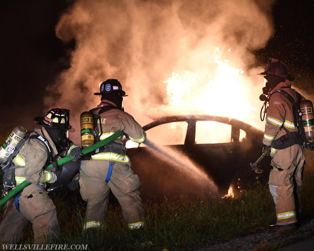 08/18/18, car fire on Old York Road early in morning, :56 a.m.  Wellsville firefighters attack blaze.  photos by curt werner