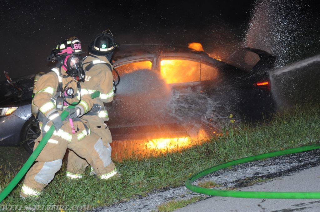 08/18/18, car fire on Old York Road early in morning, :56 a.m.  Wellsville firefighters attack blaze.  photos by curt werner