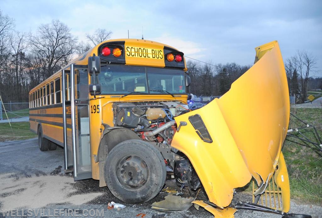 On Tuesday evening, November 19, a school bus and tractor trailer hauling corn collided at the intersection of Ridge Road and Bentz Mill Road.  photos by curt werner

