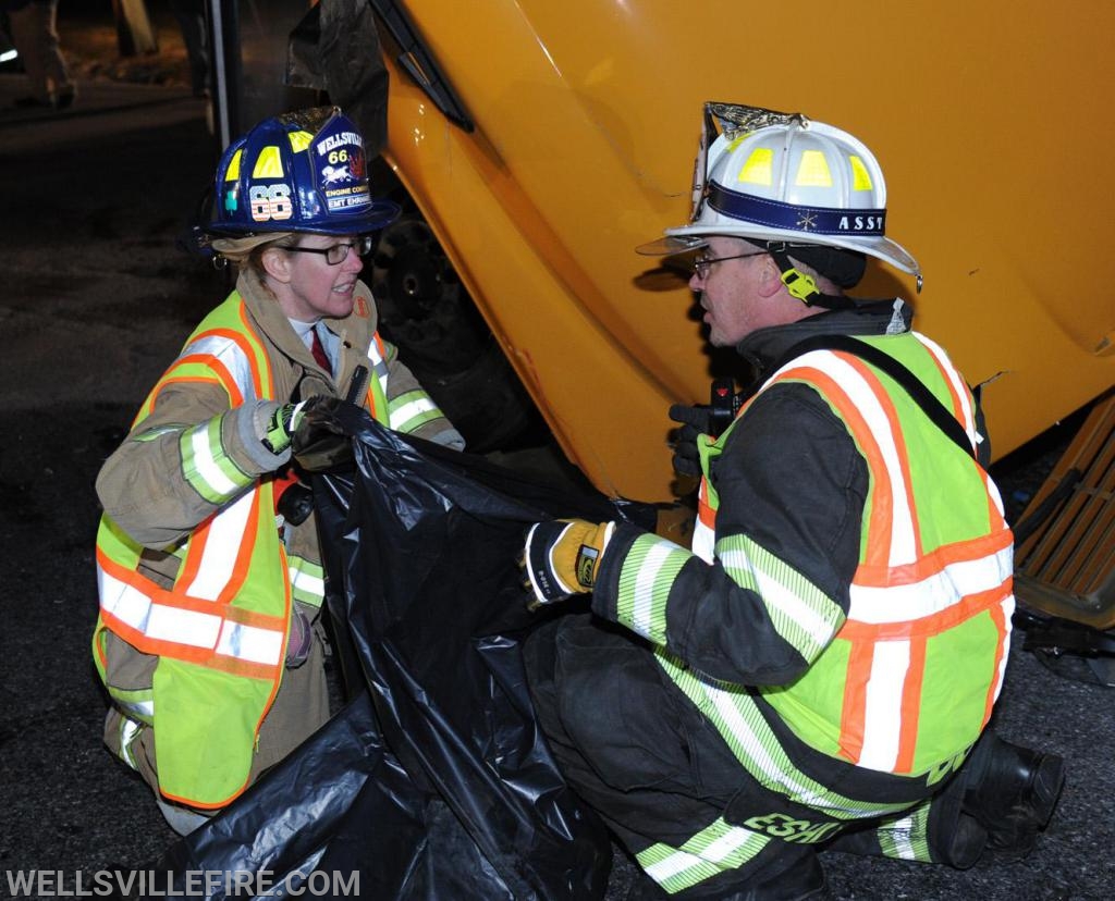 On Tuesday evening, November 19, a school bus and tractor trailer hauling corn collided at the intersection of Ridge Road and Bentz Mill Road.  photos by curt werner