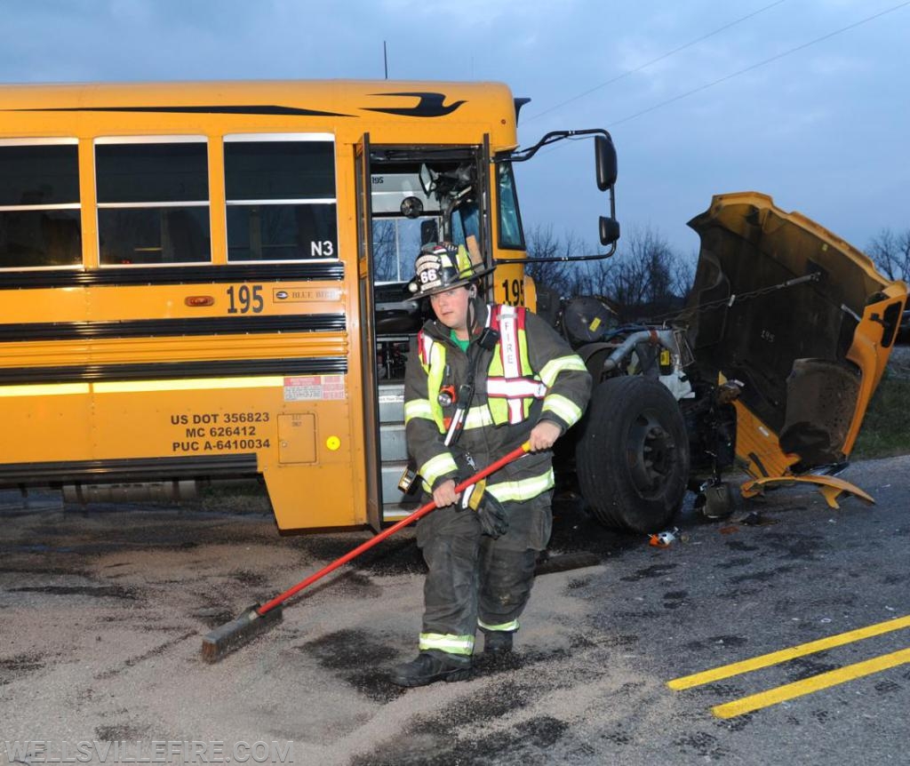 On Tuesday evening, November 19, a school bus and tractor trailer hauling corn collided at the intersection of Ridge Road and Bentz Mill Road.  photos by curt werner