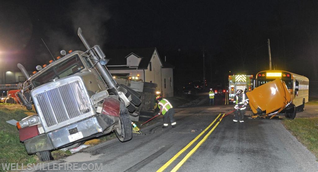 On Tuesday evening, November 19, a school bus and tractor trailer hauling corn collided at the intersection of Ridge Road and Bentz Mill Road.  photos by curt werner