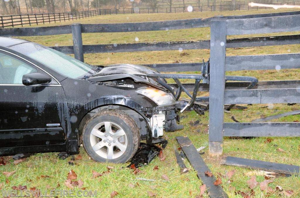 Saturday, January 5, car into fence off Wellsville Road.  photo by curt werner