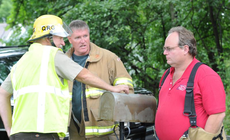 8/12/14 car into garage, photo by curt werner