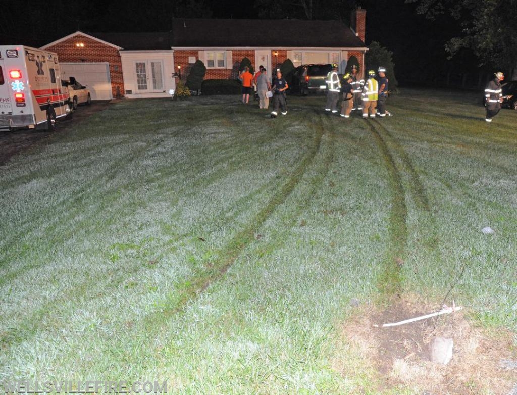 Friday night, August 23, vehicle into house on Wellsville Road.  photos by curt werner