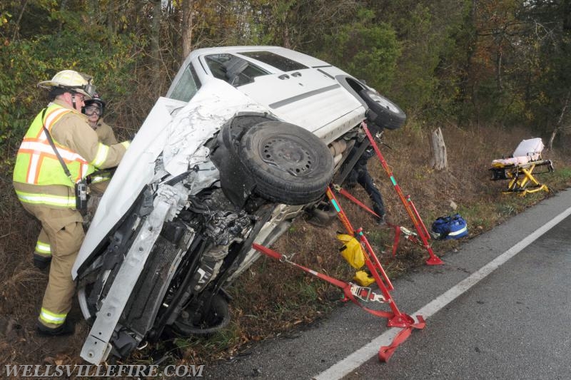 Two vehicle accident on Wellsville Road on 10/21/16.  Van on its side, driver entrapment.  photo by curt werner