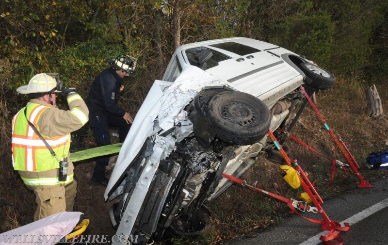 Two vehicle accident on Wellsville Road on 10/21/16.  Van on its side, driver entrapment.  photo by curt werner