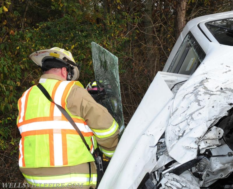 Two vehicle accident on Wellsville Road on 10/21/16.  Van on its side, driver entrapment.  photo by curt werner