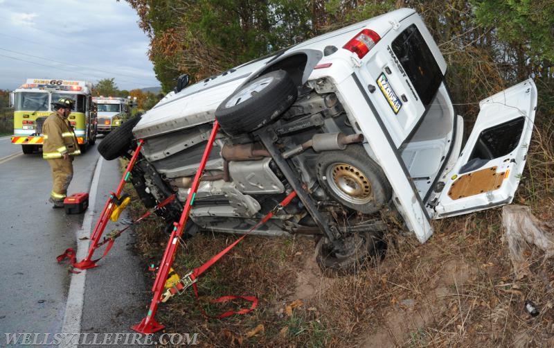 Two vehicle accident on Wellsville Road on 10/21/16.  Van on its side, driver entrapment.  photo by curt werner