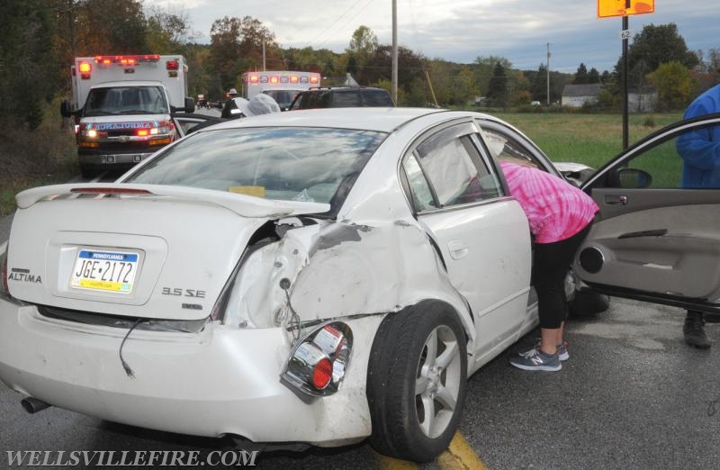 Two vehicle accident on Wellsville Road on 10/21/16.  Van on its side, driver entrapment.  photo by curt werner