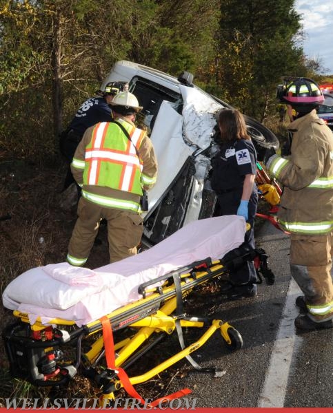 Two vehicle accident on Wellsville Road on 10/21/16.  Van on its side, driver entrapment.  photo by curt werner