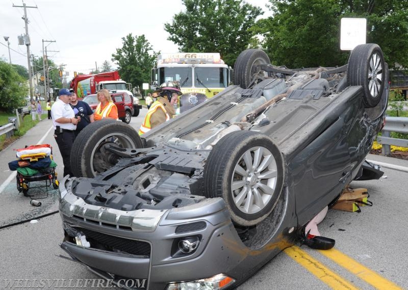 Tuesday, June 27, roll over entrapment on Rosstown Road.  photos by curt werner