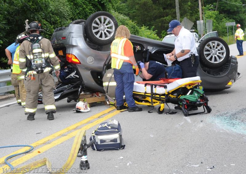 Tuesday, June 27, roll over entrapment on Rosstown Road.  photos by curt werner