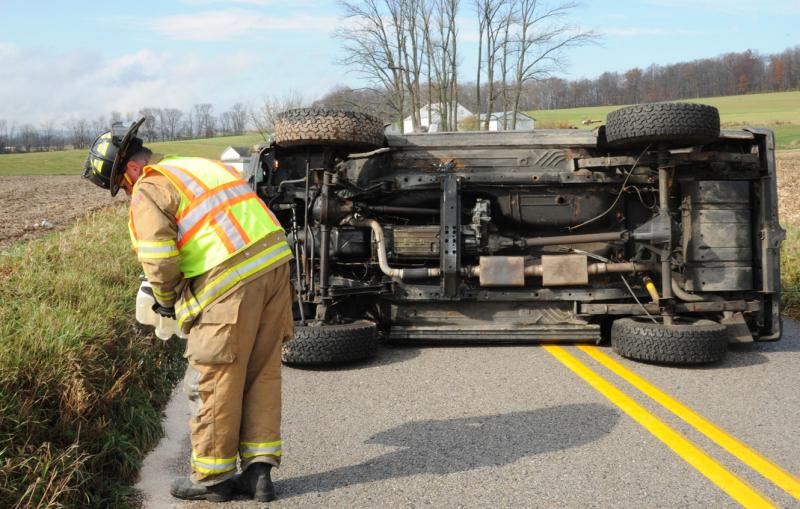 Vehicle on its side, Thursday, November 12, on Mt Zion Road.  photo by curt werner