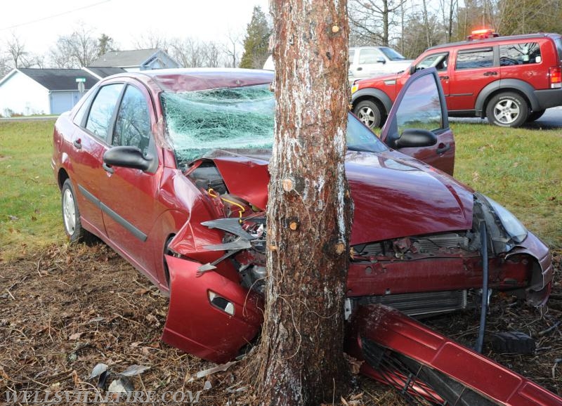 Car into tree in the 2700 block of Rosstown Road on December 7, 2016  photos by curt werner.
