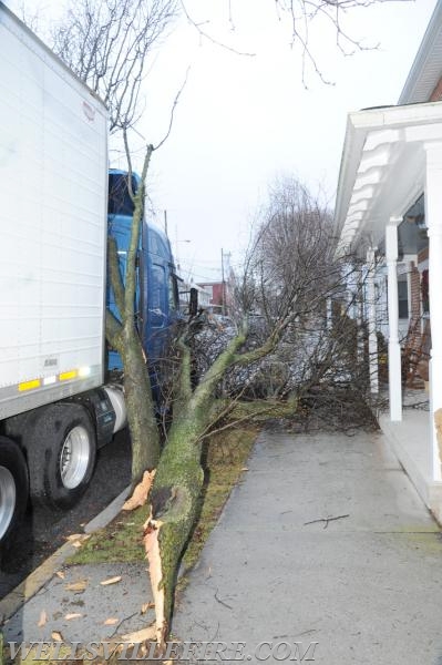 Tractor trailer hits tree into house on Main Street in Wellsville on Tuesday, January 3. photo by Curt Werner