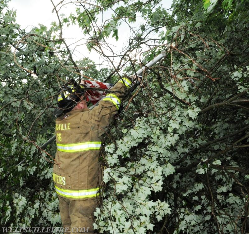 On Tuesday, June 28, 4:01 p.m., Wellsville Fire Company responded to a large tree knocked down by high winds in Warrington Township, Poplar Road.  The tree just missed falling into the house.  No injuries.   Photos by Curt Werner