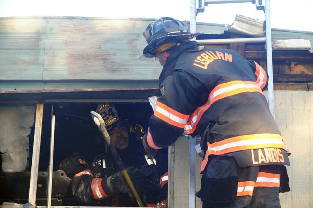 Mobile Home Filled with smoke on Friday morning, September 20.  Photo by Curt Werner